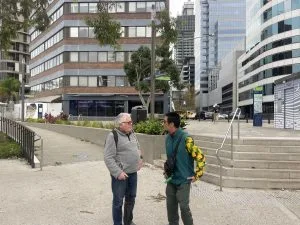 Two people having a conversation in the community