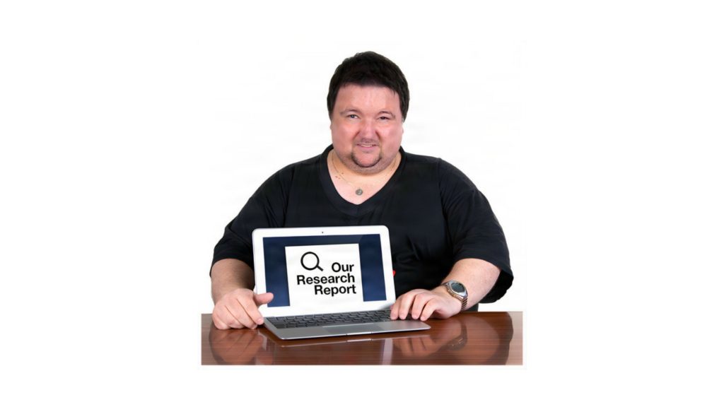 A person showing his laptop with screen showing our research report